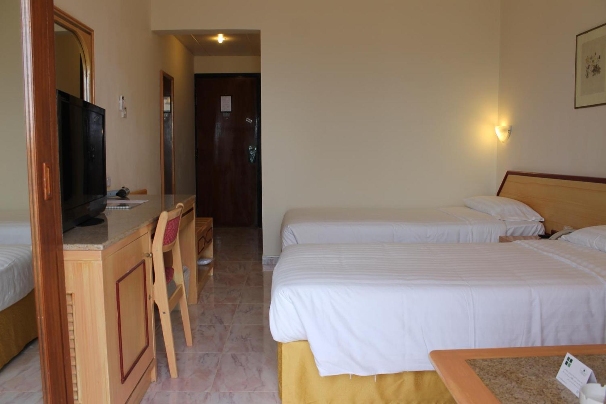 Resort Sur Beach Holiday Quarto foto