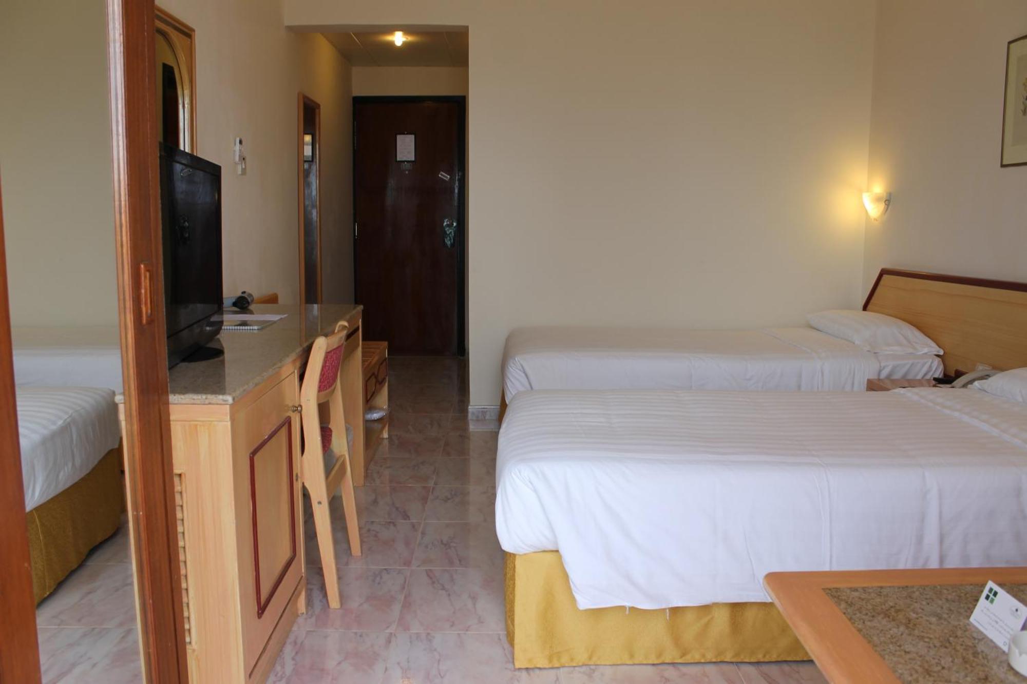 Resort Sur Beach Holiday Quarto foto